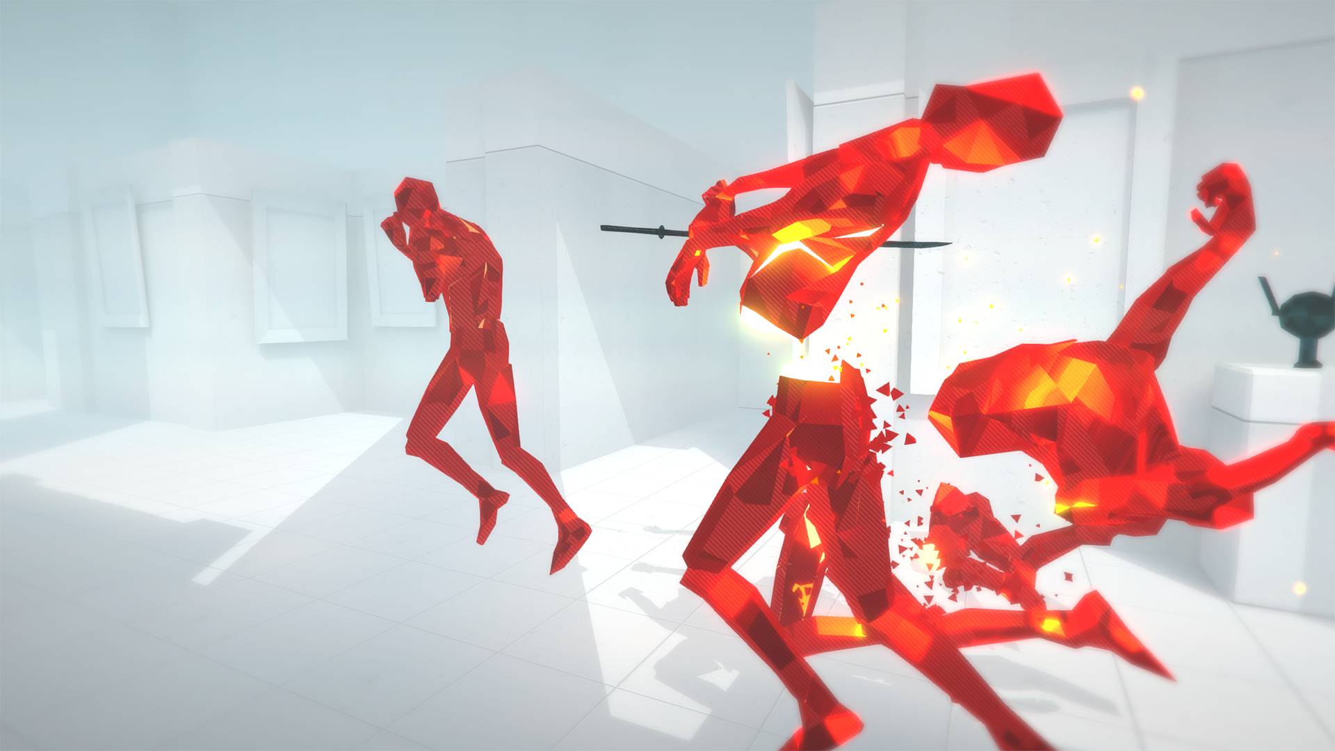A red humanoid figure falling apart, with another raising a gun in the background