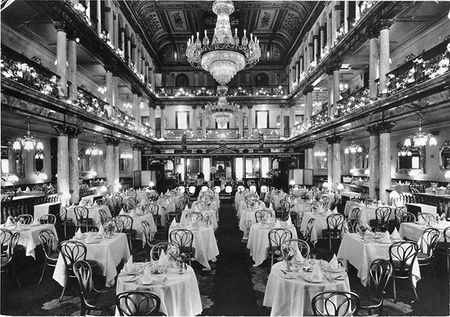 The tables set at the Holborn Dining Rooms for a Country Life Christmas Party in the 1930s. (No, it's not quite so grand these days...) ©Country Life