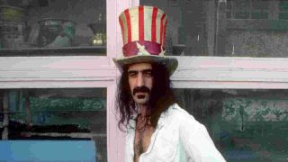 Frank Zappa posing for a photograph in an Uncle Sam hat in the early 70s