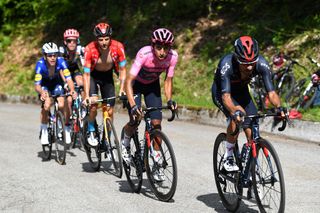 ALPE DI MERA VALSESIA ITALY MAY 28 Daniel Felipe Martinez Poveda of Colombia and Team INEOS Grenadiers Egan Arley Bernal Gomez of Colombia and Team INEOS Grenadiers Pink Leader Jersey Damiano Caruso of Italy and Team Bahrain Victorious Joao Almeida of Portugal and Team Deceuninck QuickStep Hugh Carthy of United Kingdom and Team EF Education Nippo in breakaway during the 104th Giro dItalia 2021 Stage 19 a 166km stage from Abbiategrasso to Alpe di Mera Valsesia 1531m Stage modified due to the tragic events on May the 23rd 2021 that involved the Mottarone Cableway UCIworldtour girodiitalia Giro on May 28 2021 in Alpe di Mera Valsesia Italy Photo by Tim de WaeleGetty Images