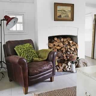 living room with logs stacked fireplace