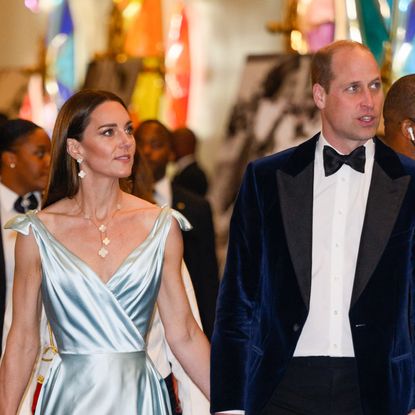 Kate Middleton wears a pale blue silk gown while Prince William wears a suit in 2022 Getty Images/Pool/Samir Hussein/WireImage
