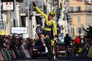 Team Visma-Lease a Bike's US rider Matteo Jorgenson wearing the overall leader's yellow jersey celebrates as he cycles across the finish line in second place, to win the Paris-Nice cycling race, after the 8th and final stage, 119,9 km between Nice and Nice, on March 16, 2025. (Photo by Anne-Christine POUJOULAT / AFP)