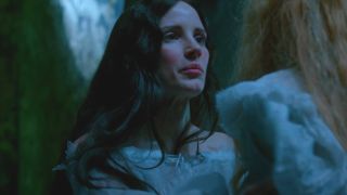 Jessica Chastain confronts Mia Wasikowska at night in Crimson Peak.