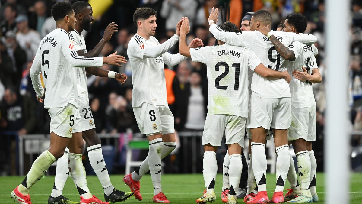 Real Madrid players celebrate scoring a goal against La Liga opponent Las Palmas