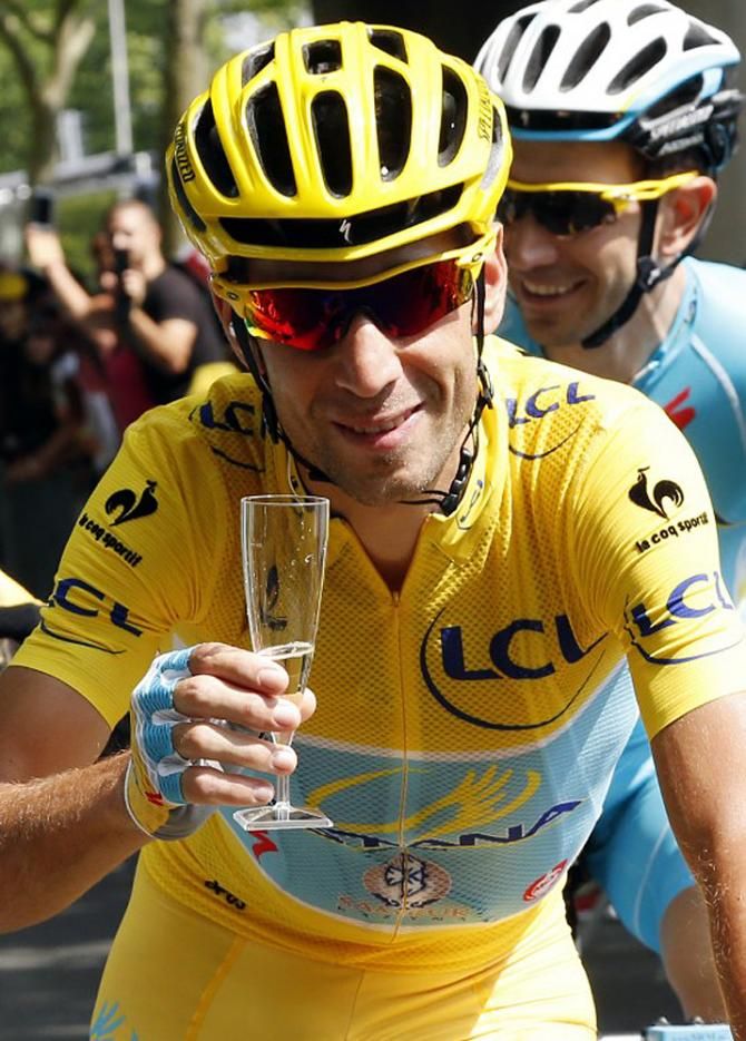 Nibali enjoys a well-derserved glass of champagne during the Tour de France finale