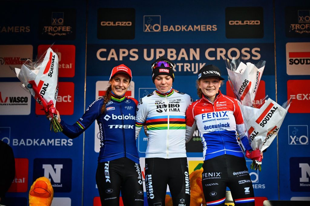 From L to R Dutch rider Lucinda Brand Dutch rider Fem Van Empel and Dutch rider Puck Pieterse stand on the podium after the womens elite race at the Urban Cross Kortrijk cyclocross cycling event the second stage in the X2O Badkamers Trofee Veldrijden competition in Kortrijk on November 25 2023 Photo by JASPER JACOBS Belga AFP Belgium OUT Photo by JASPER JACOBSBelgaAFP via Getty Images