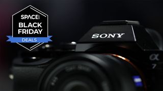 A close up of a Sony camera with a Space Black Friday Deals Logo