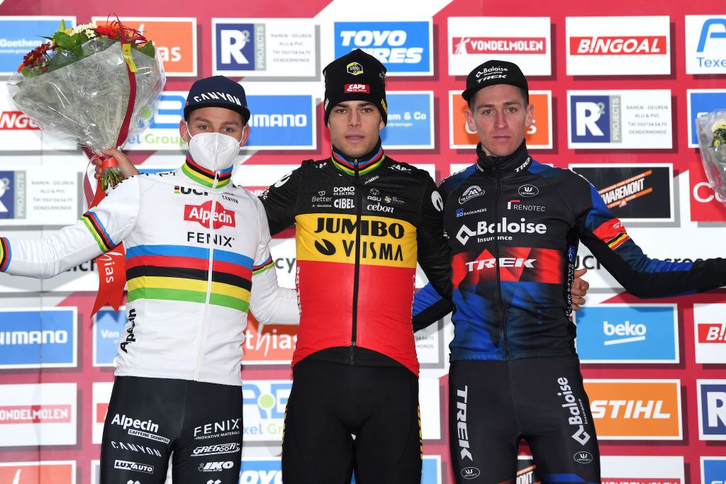DENDERMONDE BELGIUM DECEMBER 26 LR Mathieu Van Der Poel of The Netherlands and Team Alpecin Fenix on second place race winner Wout Van Aert of Belgium and Team JumboVisma and Toon Aerts of Belgium and Team Baloise Trek Lions on third place pose on the podium ceremony after the 2nd Dendermonde UCI CycloCross Worldcup 2021 Mens Elite CXWorldCup UCIcyclocrossWC on December 26 2021 in Dendermonde Belgium Photo by Luc ClaessenGetty Images