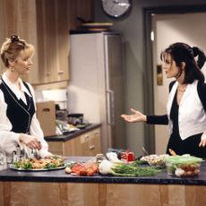 Scene from 'Friends', Phoebe and Monica preparing food as caterers