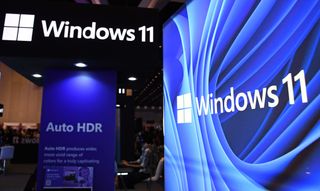 Windows 11 logo displayed at a stand at the Mumbai Comic Con conference