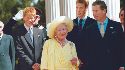 Queen Mum Elizabeth surrounded by great-grandsons Prince Henry (L) and Prince William (2R) and grandson Prince Charles at her 99th birthday celebration at Clarence House.