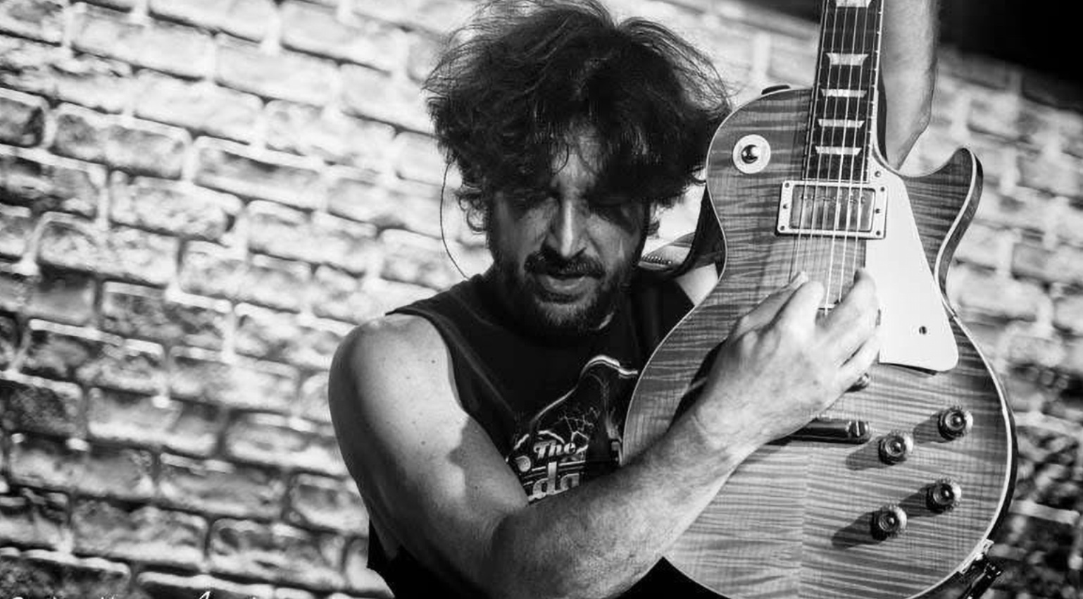 Doug Rappoport wields a Les Paul onstage