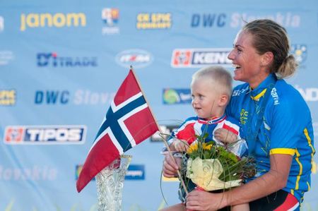 Gunn-Rita Dahle Flesj&aring; and son after winning the European championship title