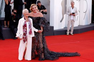 Florence Pugh (R) and her grandmother attend the "Don't Worry Darling" red carpet at the 79th Venice International Film Festival on September 05, 2022 in Venice, Italy.