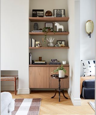 Wooden alcove shelves in neutral living room