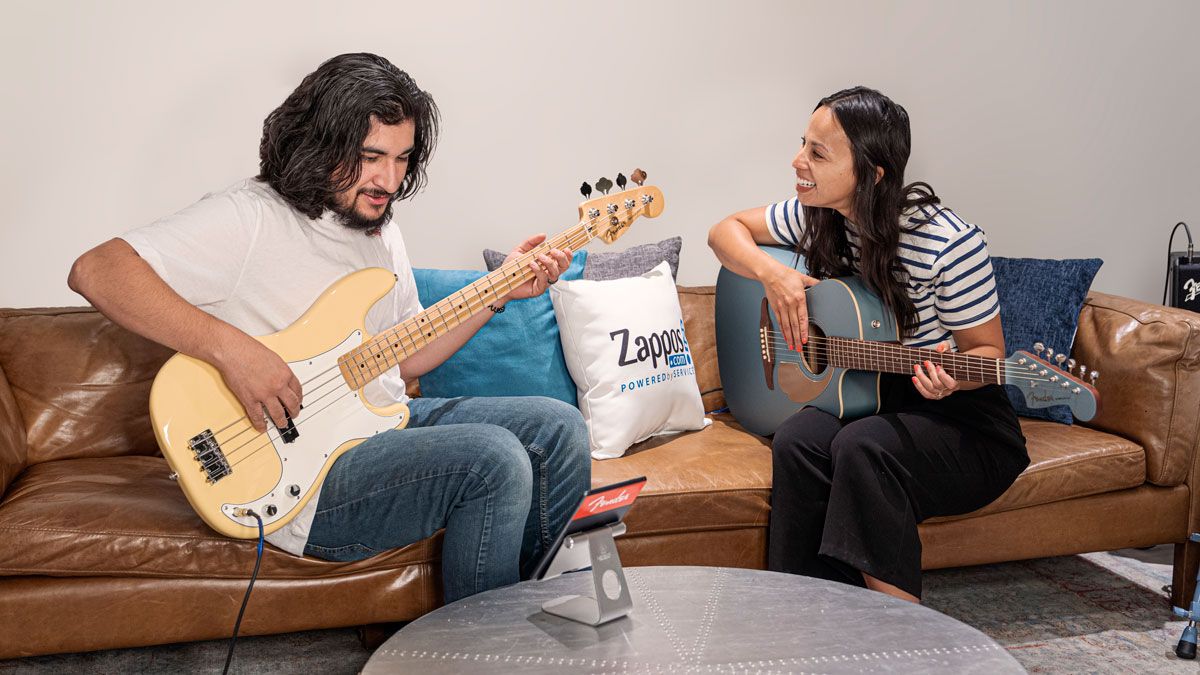 Zappos employees play Fender guitars