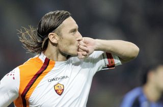 Francesco Totti celebrates after scoring for Roma against Inter in October 2005.