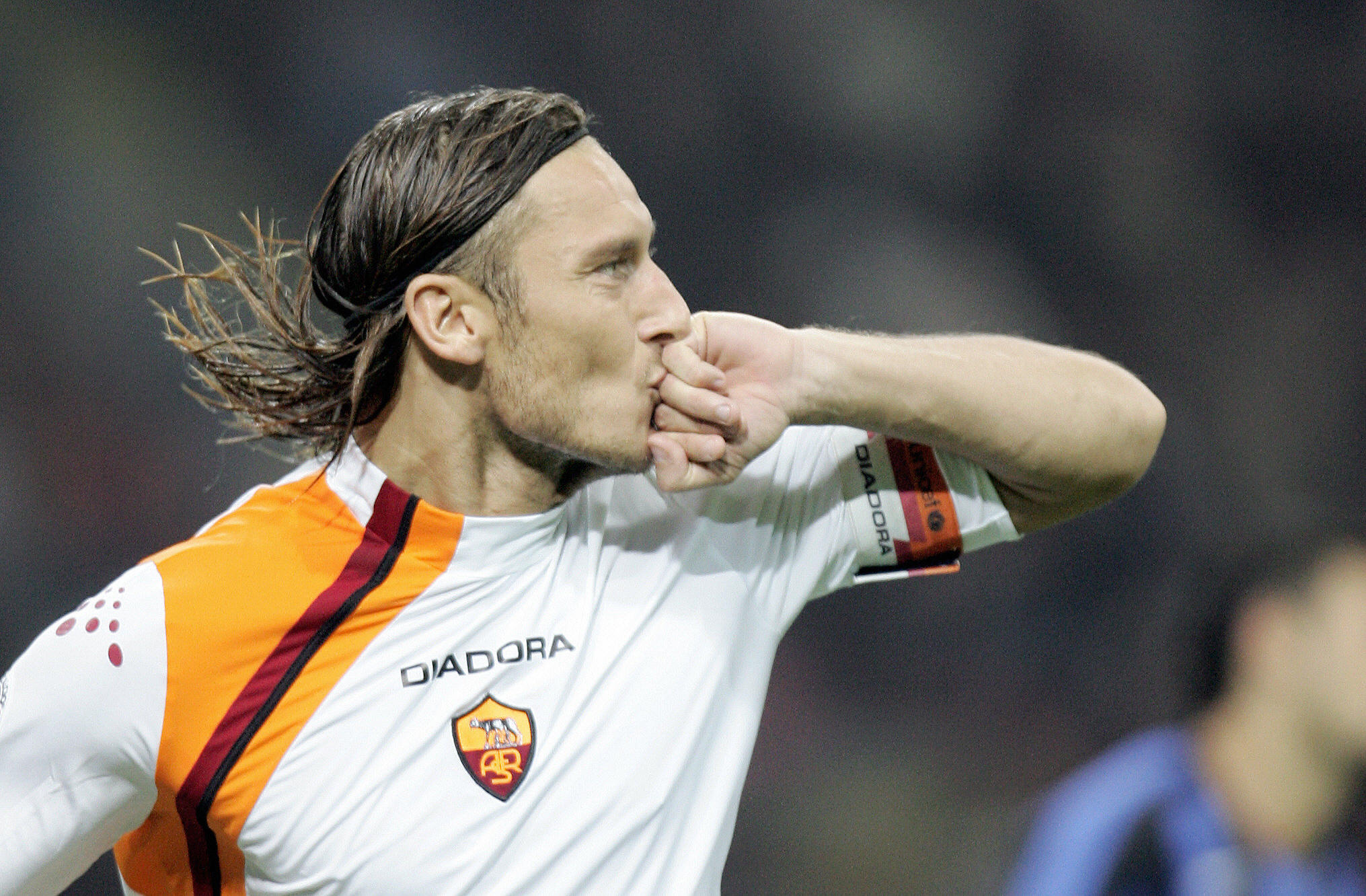 Francesco Totti celebrates after scoring for Roma against Inter in October 2005.