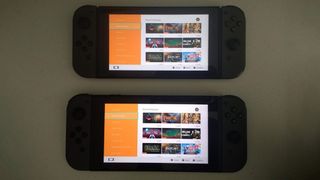 Nintendo Switch and Switch V2 next to each other.