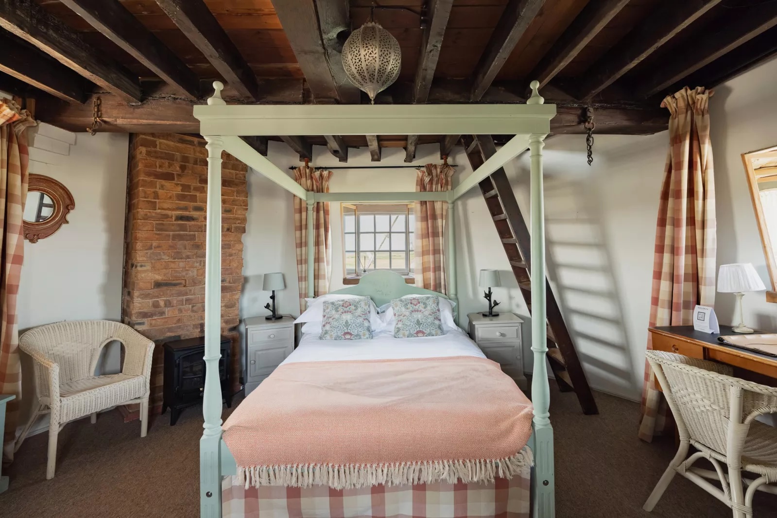One of the bedrooms in the windmill at Cley. It is rustic but charming