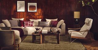 Damson living room with damson cushions on a corner sofa to highlight interior colour trends