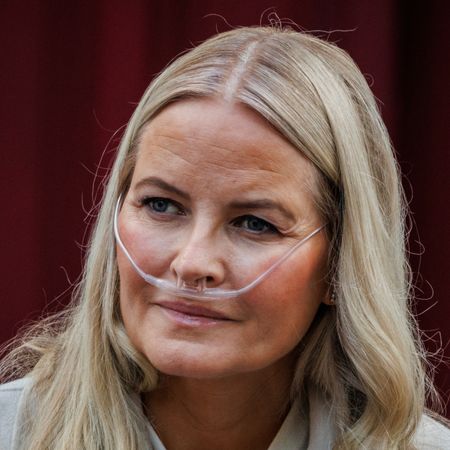 Crown Princess Mette-Marit wearing an oxygen tube