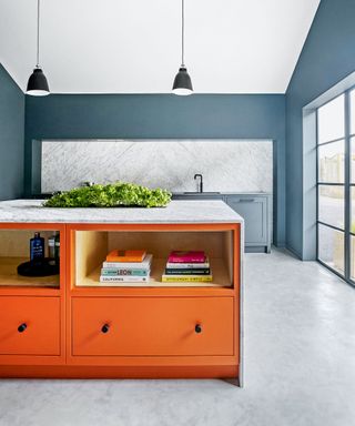 Colorful kitchen idea with orange painted island