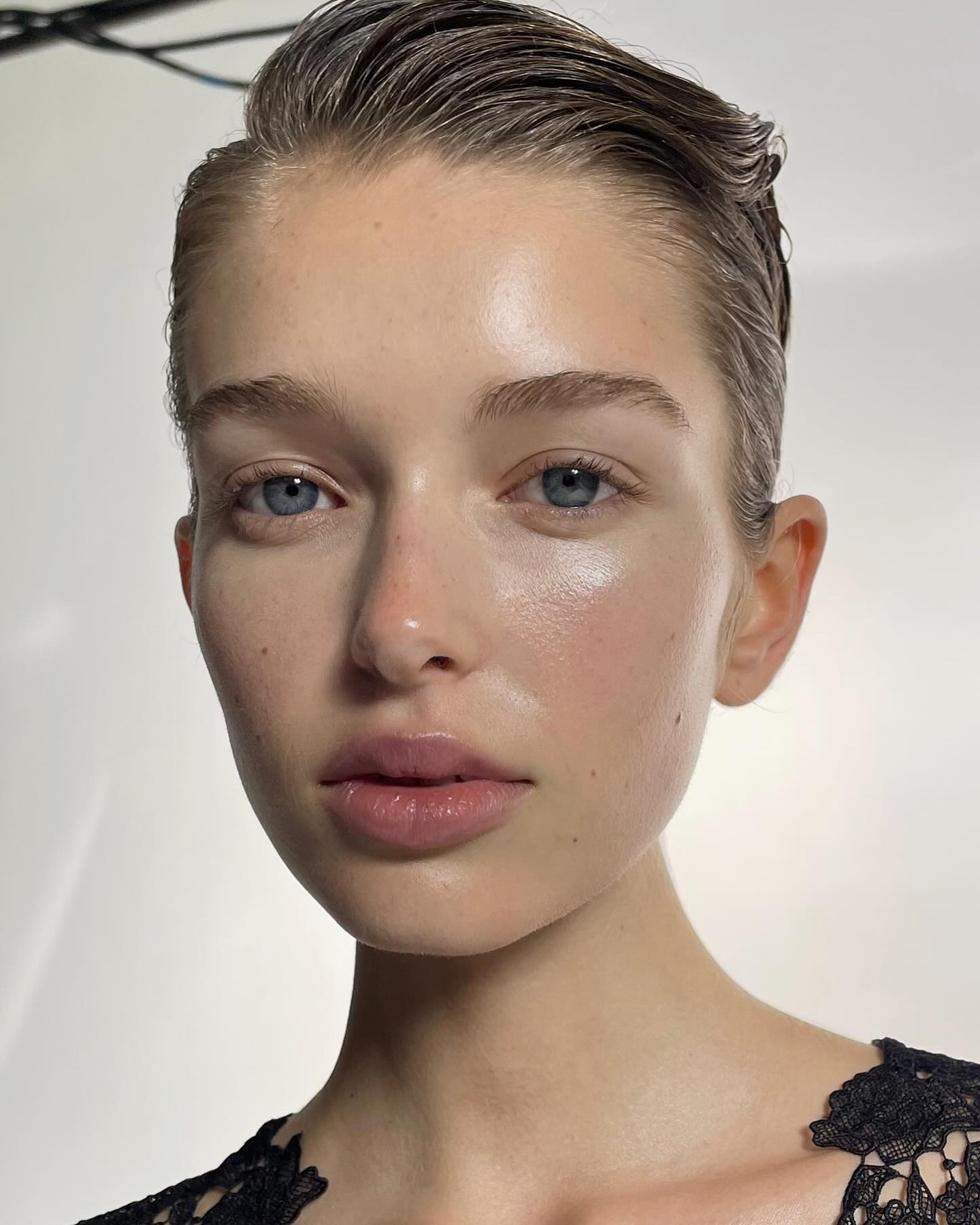 A dewy, natural-looking makeup look by David Razzano