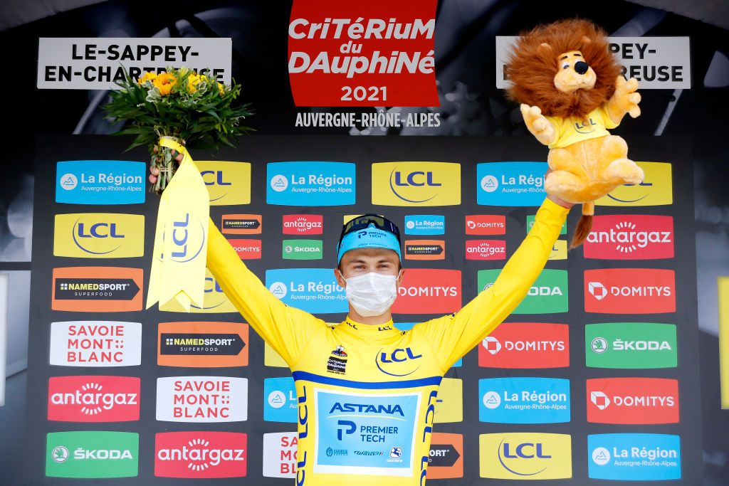LE SAPPEYENCHARTREUSE FRANCE JUNE 04 Alexey Lutsenko of Kazahkstan and Team Astana Premier Tech yellow leader jersey celebrates at podium during the 73rd Critrium du Dauphin 2021 Stage 6 a 1672km stage from LoriolsurDrome to Le SappeyenChartreuse 1003m Mascot UCIworldtour Dauphin dauphine on June 04 2021 in Le SappeyenChartreuse France Photo by Bas CzerwinskiGetty Images