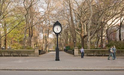 16-ft-tall aluminium timepiece at the entrance to Central Park