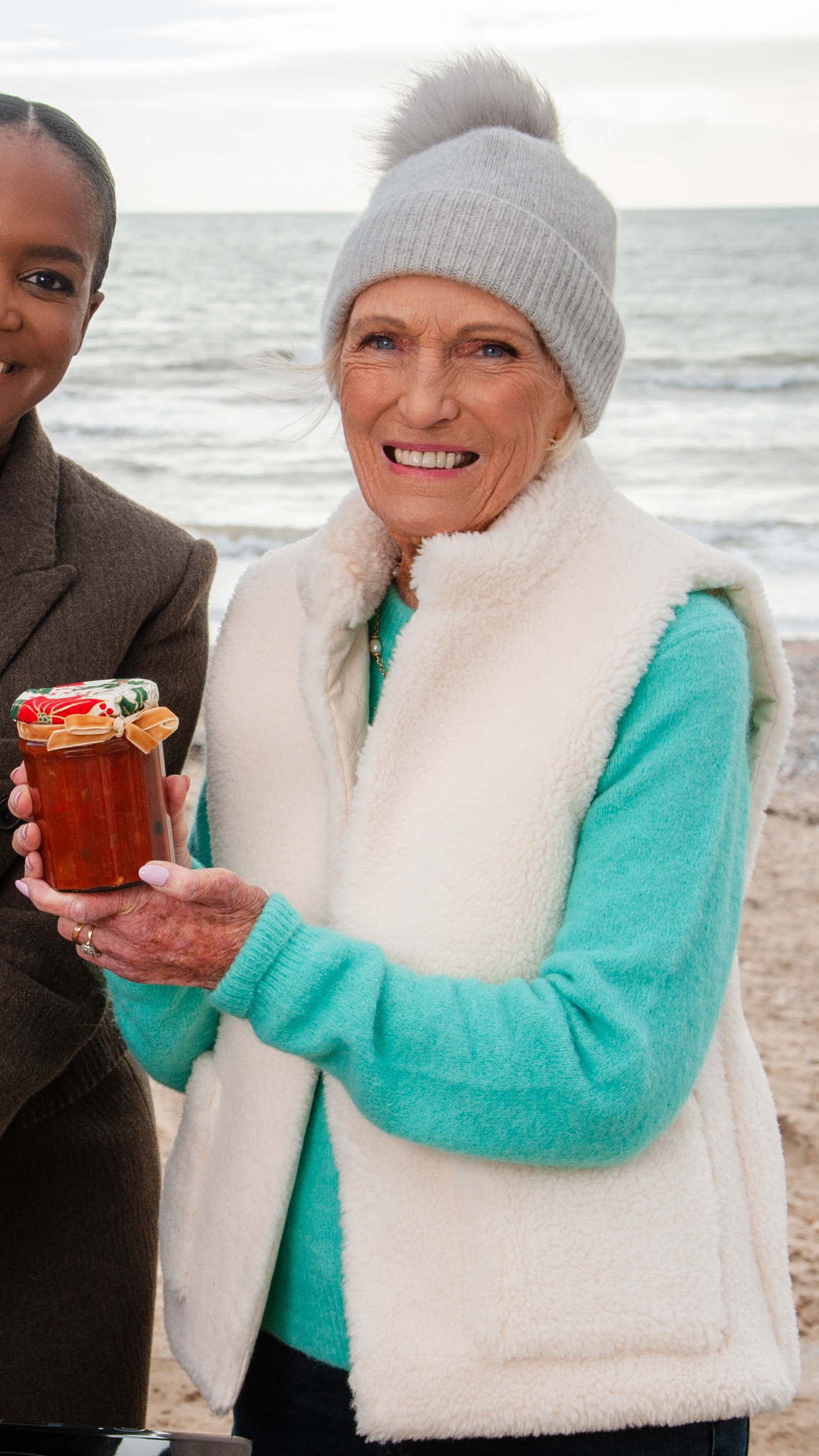 Mary Berry proudly holds the chutney she and Oti Mabuse made on Camber Sands beach