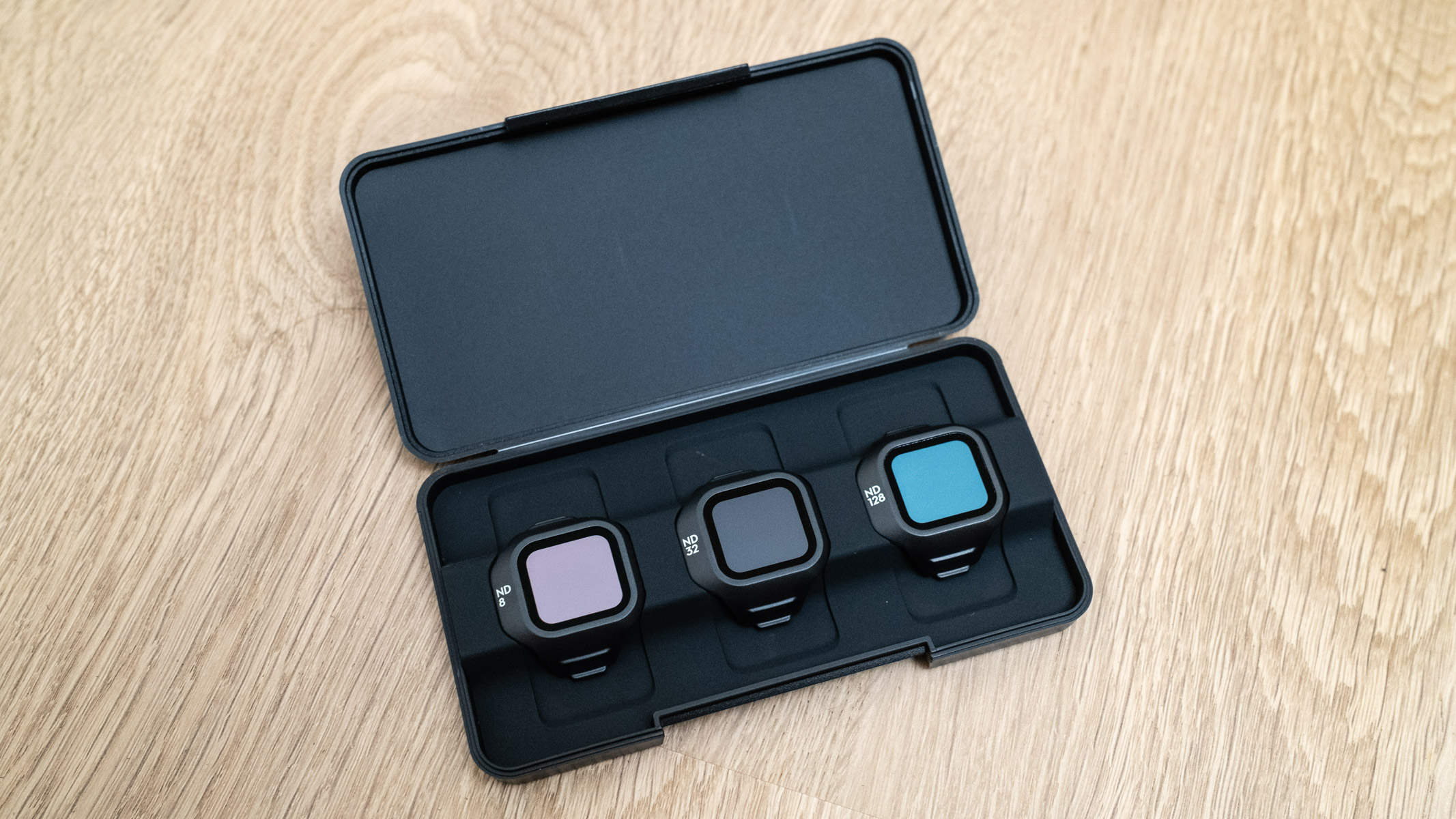 DJI Mini 5 Pro ND filters on a wooden floor