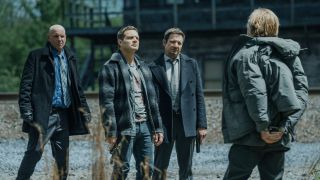 L-R: Hugh Dillon as Ian, Taylor Handley as Kyle McLusky, Jeremy Renner as Mike McLusky, and Richard Brake as Merle Callahan in Mayor of Kingstown episode 10, season 4, streaming on Paramount+, 2025.