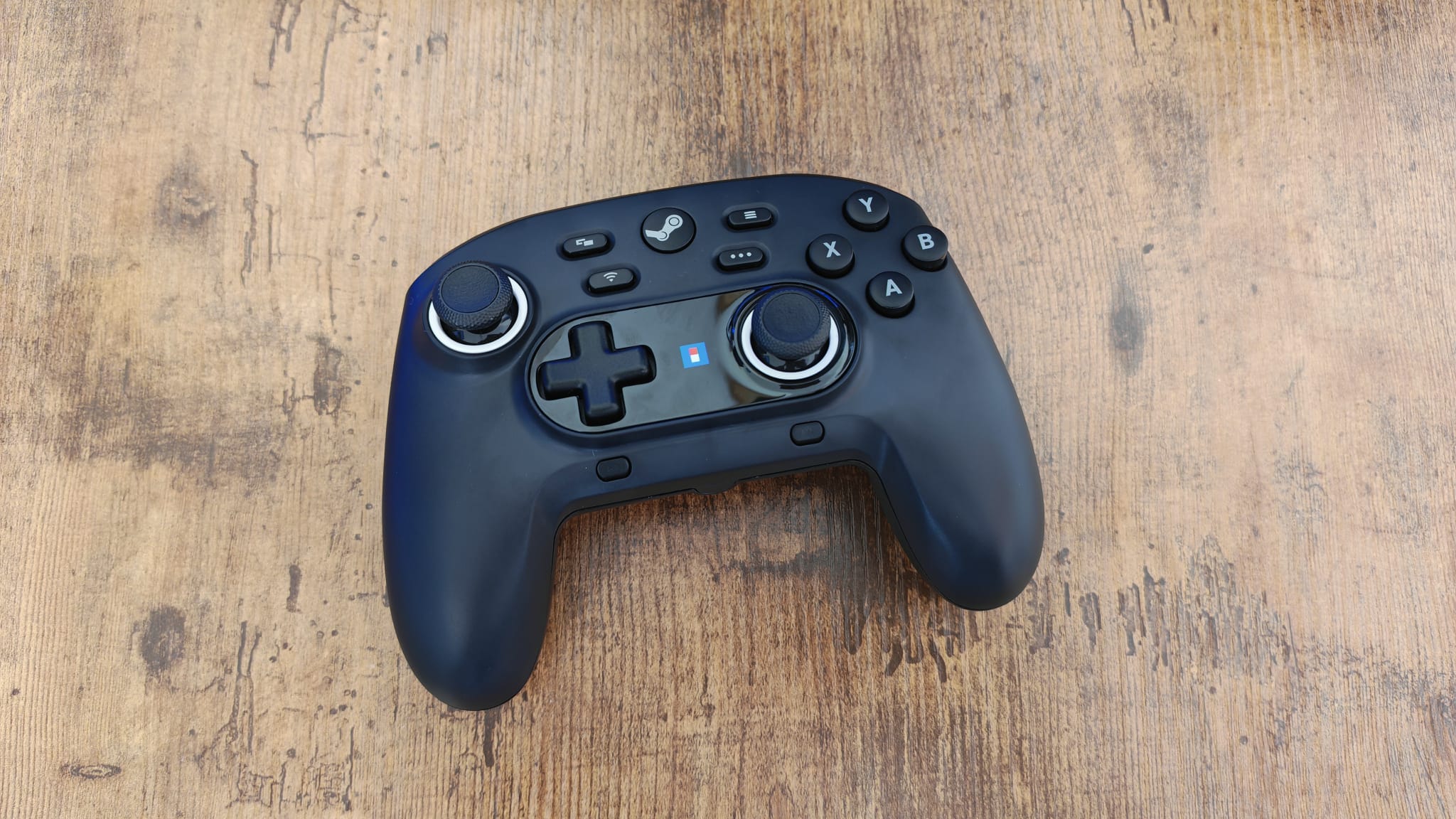 The Hori Wireless HORIPAD for Steam on a desk
