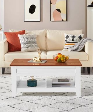 A white coffee table and couch in a living room