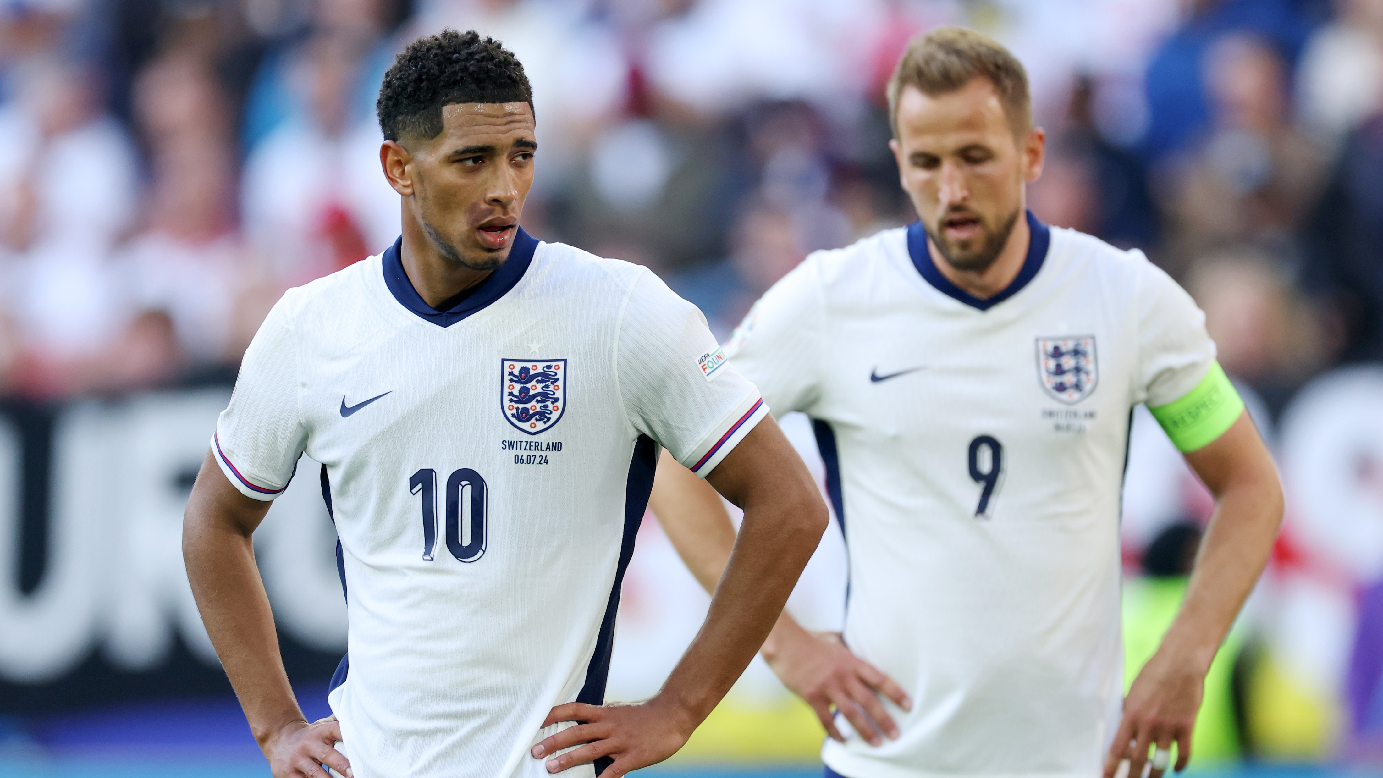 Jude Bellingham and Harry Kane of England react during the UEFA EURO 2024 quarter-final match between England and Switzerland at D&uuml;sseldorf Arena on July 06, 2024 in Dusseldorf, Germany.