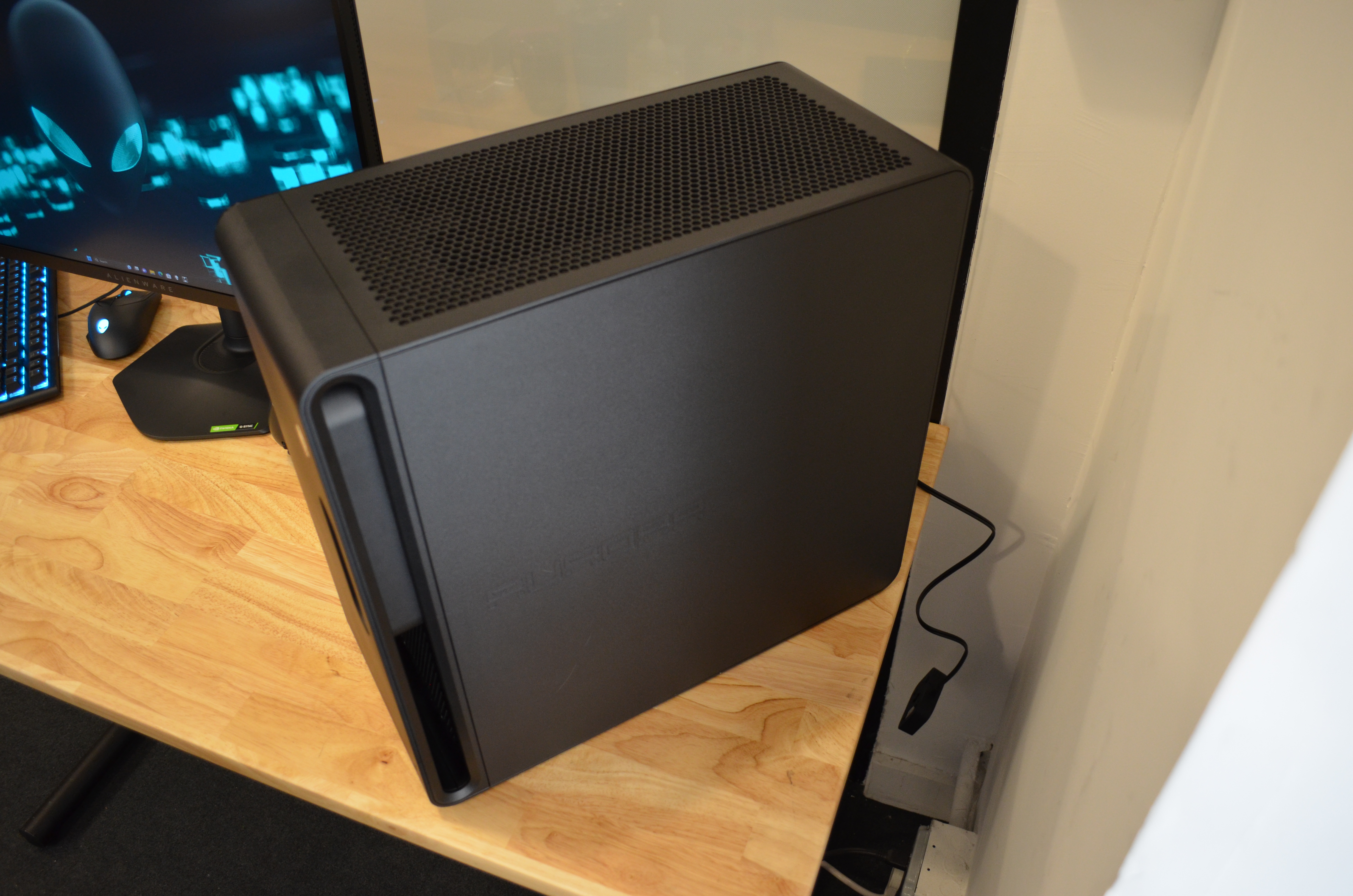 black gaming PC with glass side