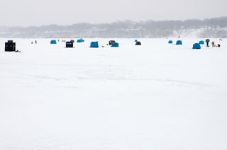 Ice fishing is popular on Lake Erie. The lake freezes over more than the other Great Lakes.