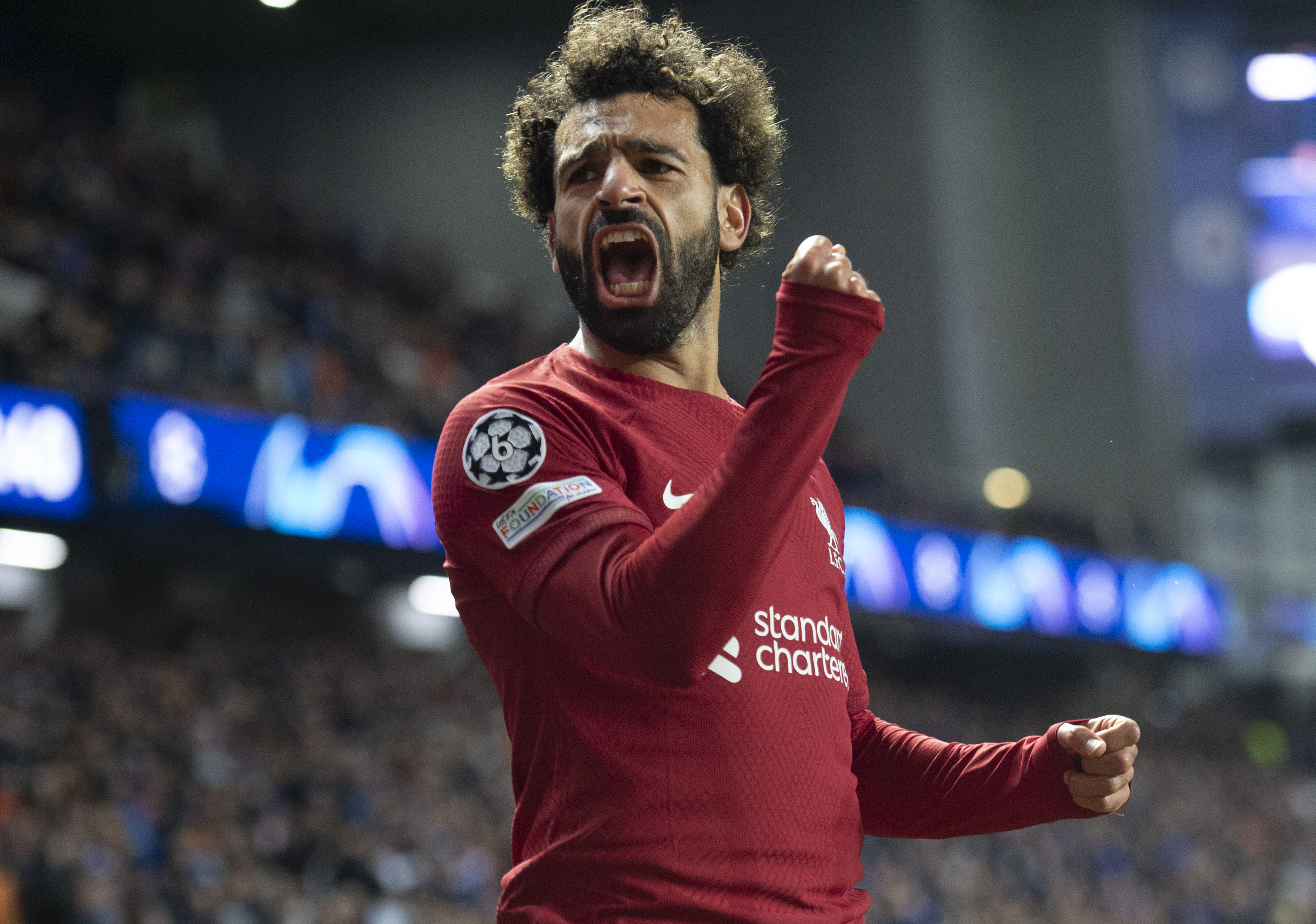 Mohamed Salah celebrates after scoring his third goal for Liverpool against Rangers at Ibrox in October 2022.