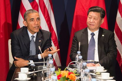 President Obama and Chinese President Xi Jinxing at a climate summit in France