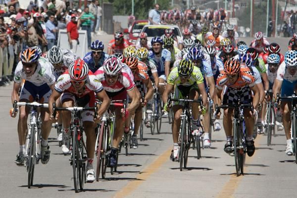Javier Benitez (Contentpolis-Ampo) powers to the finish line at the head of the peloton.