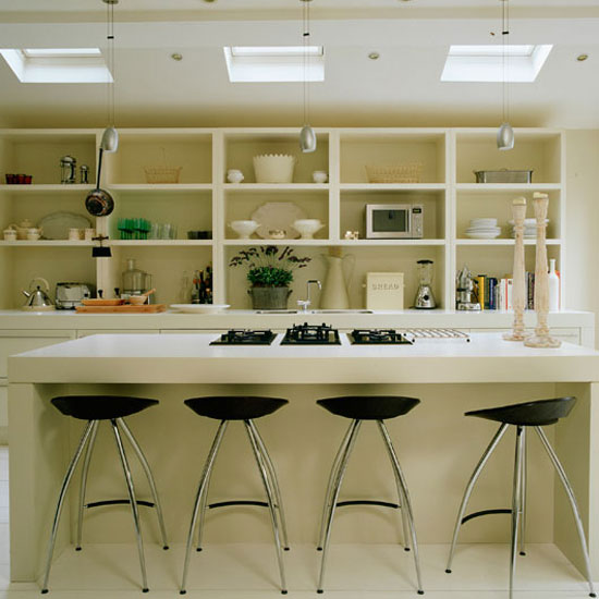 kitchen dinner room with open shelve and gas stove