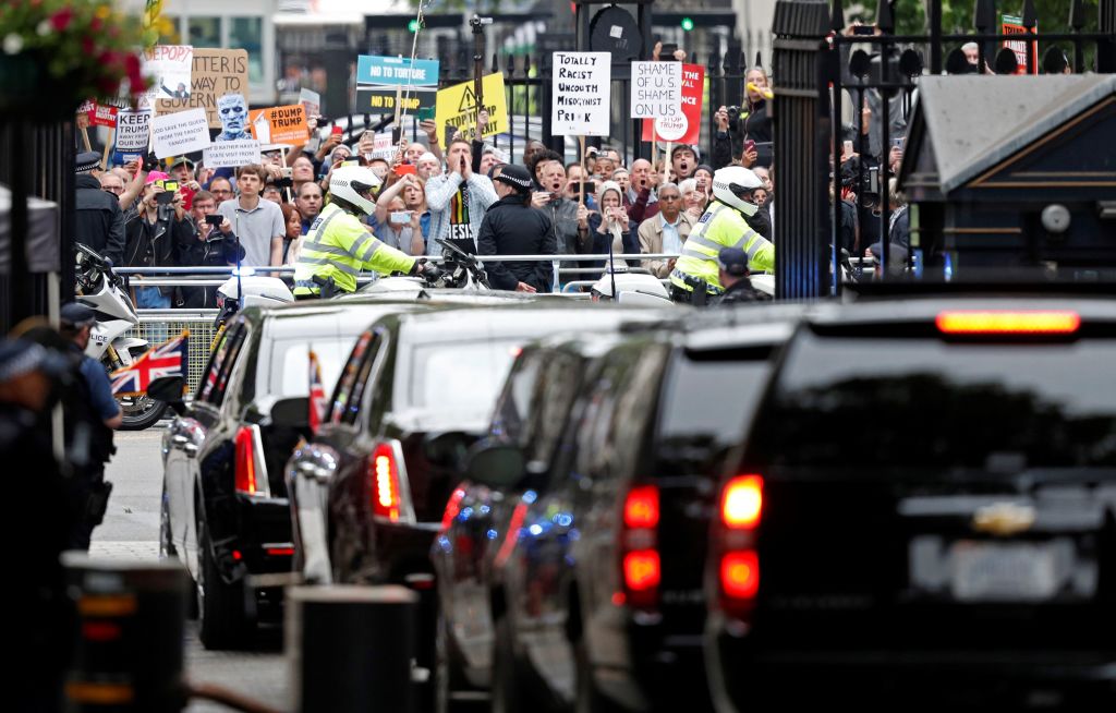Trump apparently doesn't see the protest in front of him