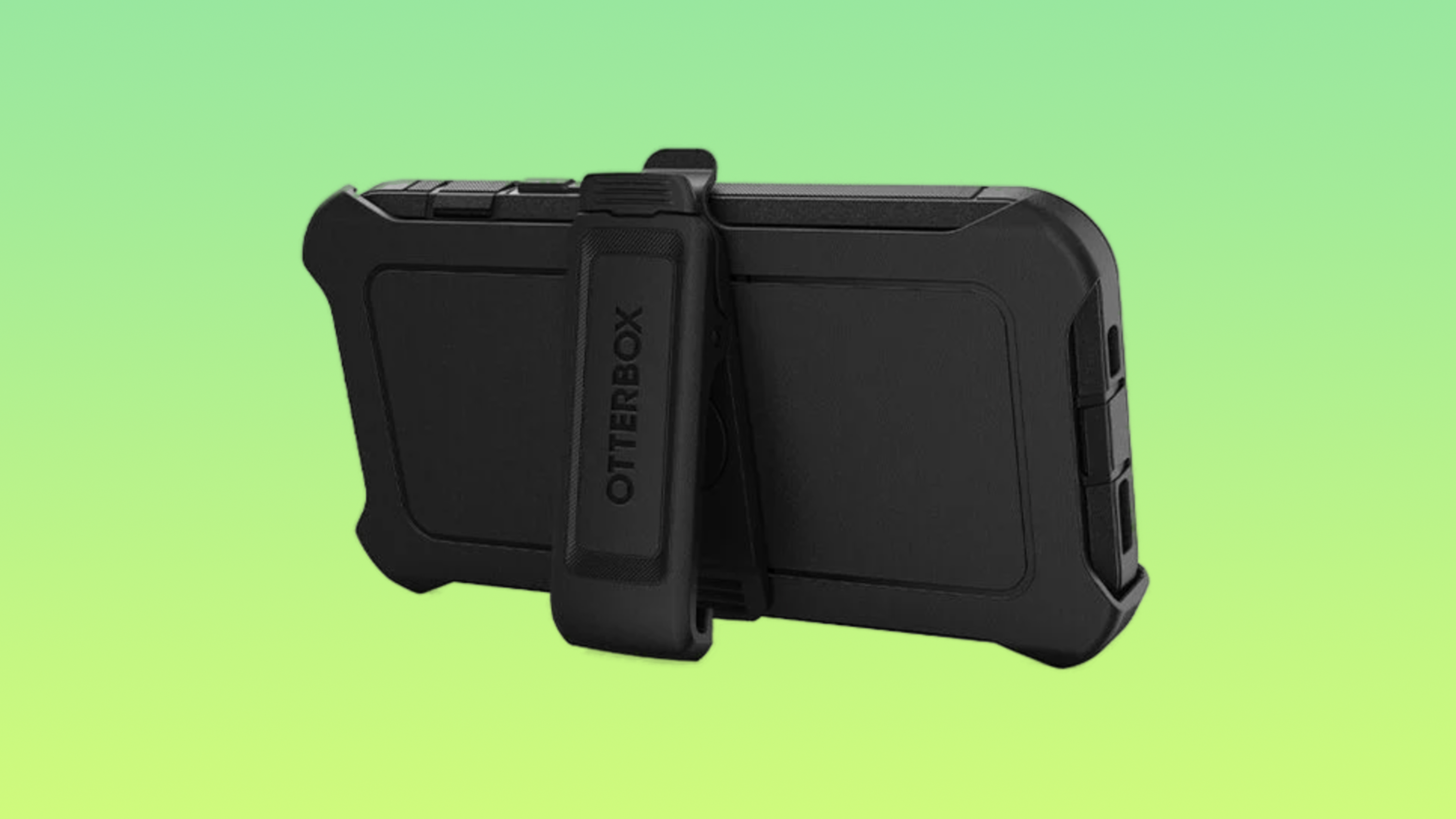 An otterbox defender series xt holster against a green background.