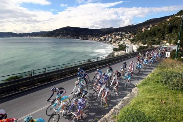 The peloton makes its way past epic scenery in Italy