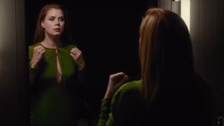 Amy Adams looking at herself in the mirror in Nocturnal Animals