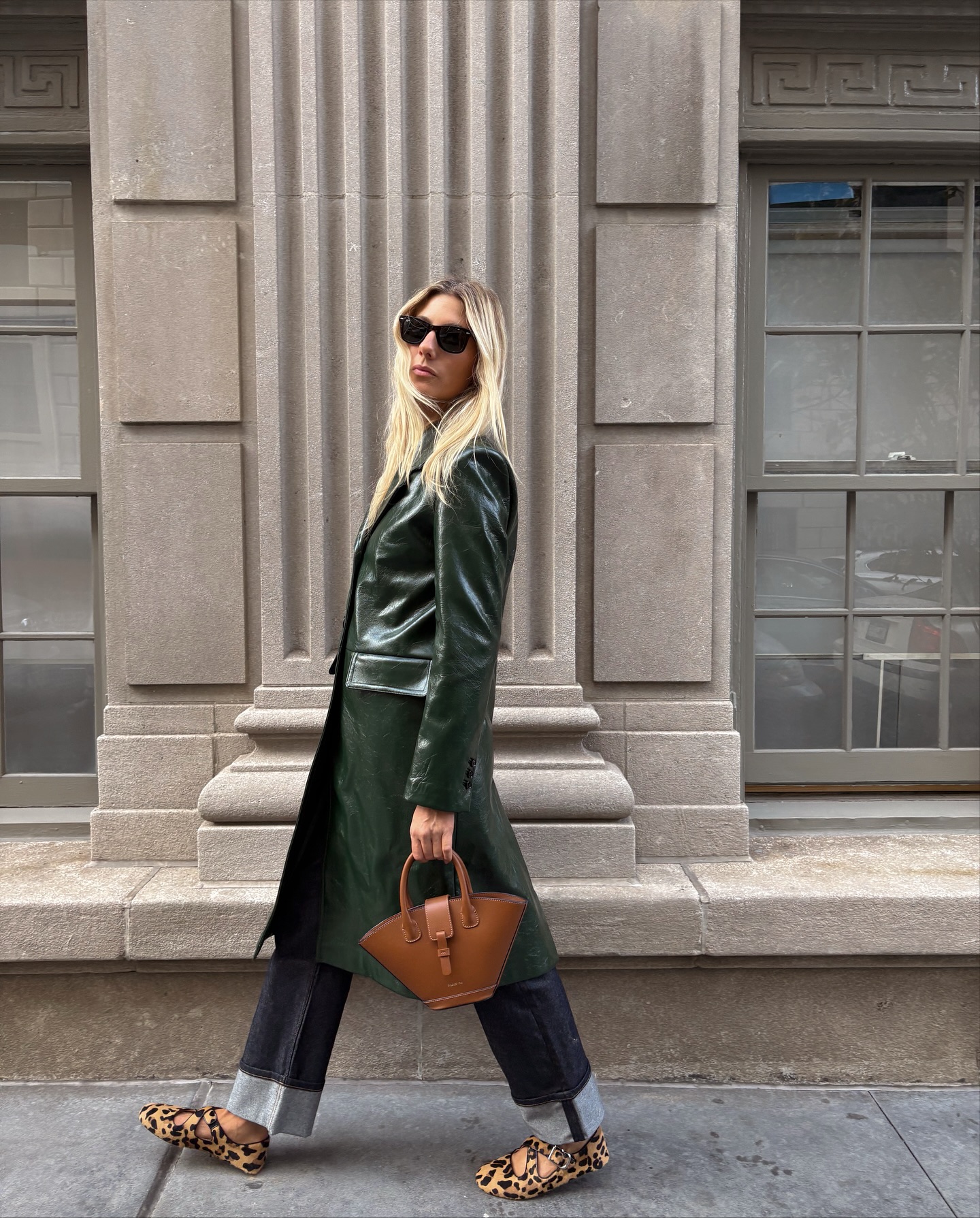 Lilly Sisto wears dark jeans with turned up hems