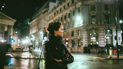 Lone woman in a city