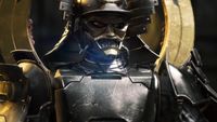 Screenshot from the sci-fi game SOL Shogunate showing a futuristic samurai in metallic armor, with intricate details and a golden hue. 